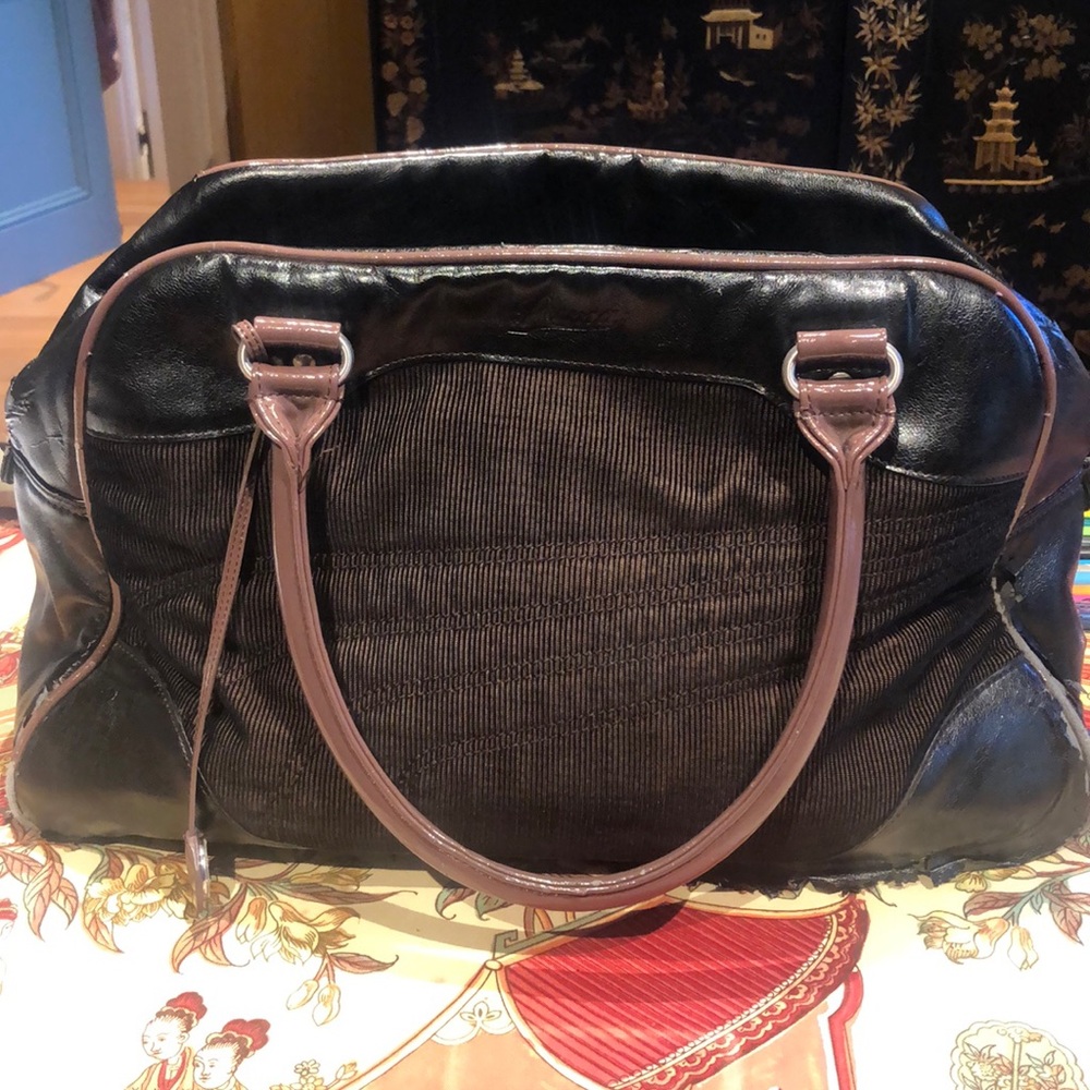 Puma travel sued duffel bag.